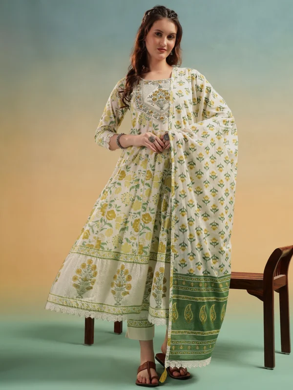 Woman wearing cream Jaipur handblock print cotton A-line suit set with dupatta for summer